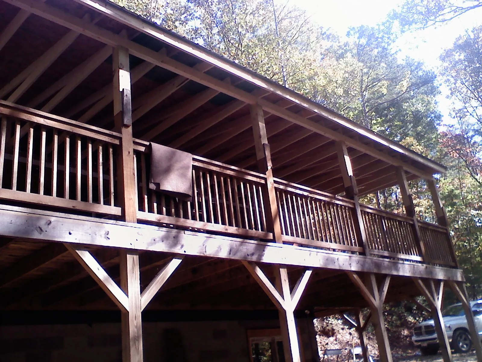 Timber framing under a new elevated porch and deck — Roof Leak Repair in Groveland by Roofing Brothers